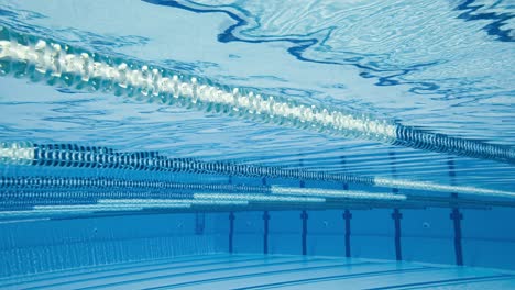 Olympic-Swimming-pool-under-water-background.